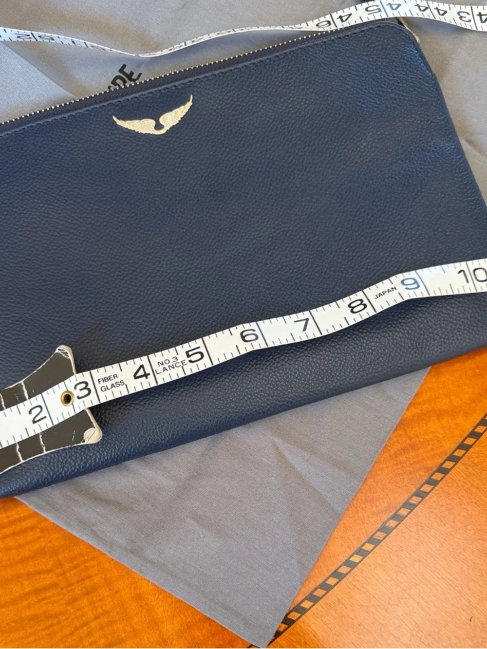 Zadig & Voltaire Navy Pebbled Leather Wristlet with Silver Wing Logo